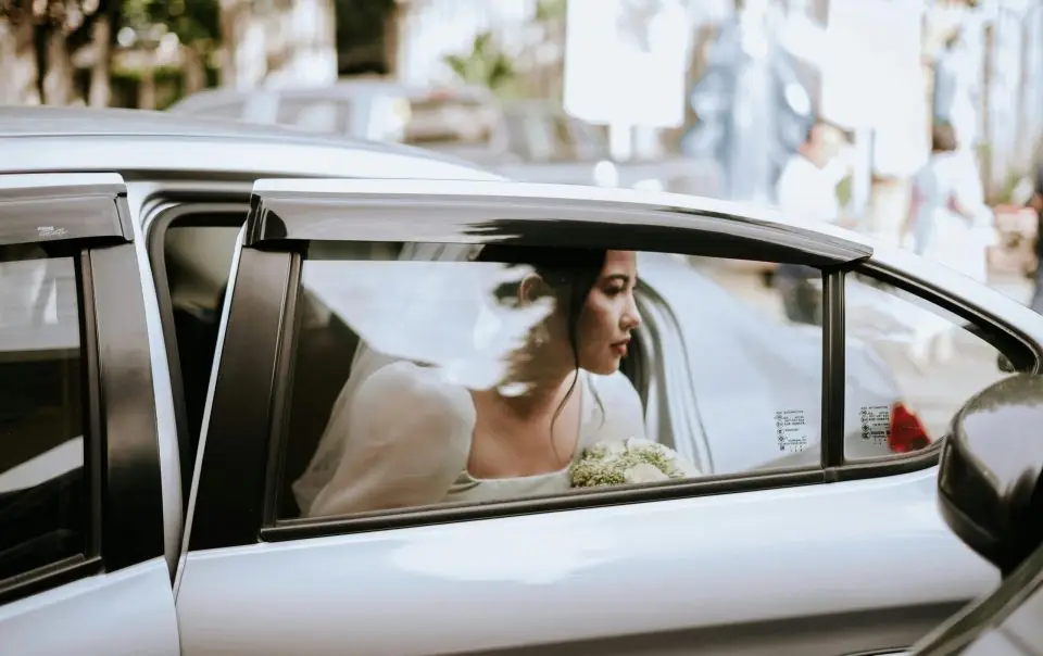 Bride getting out of the car