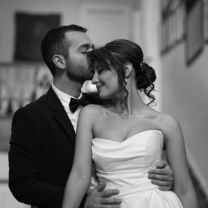 Groom kissing the Bride on her Forehead, squared