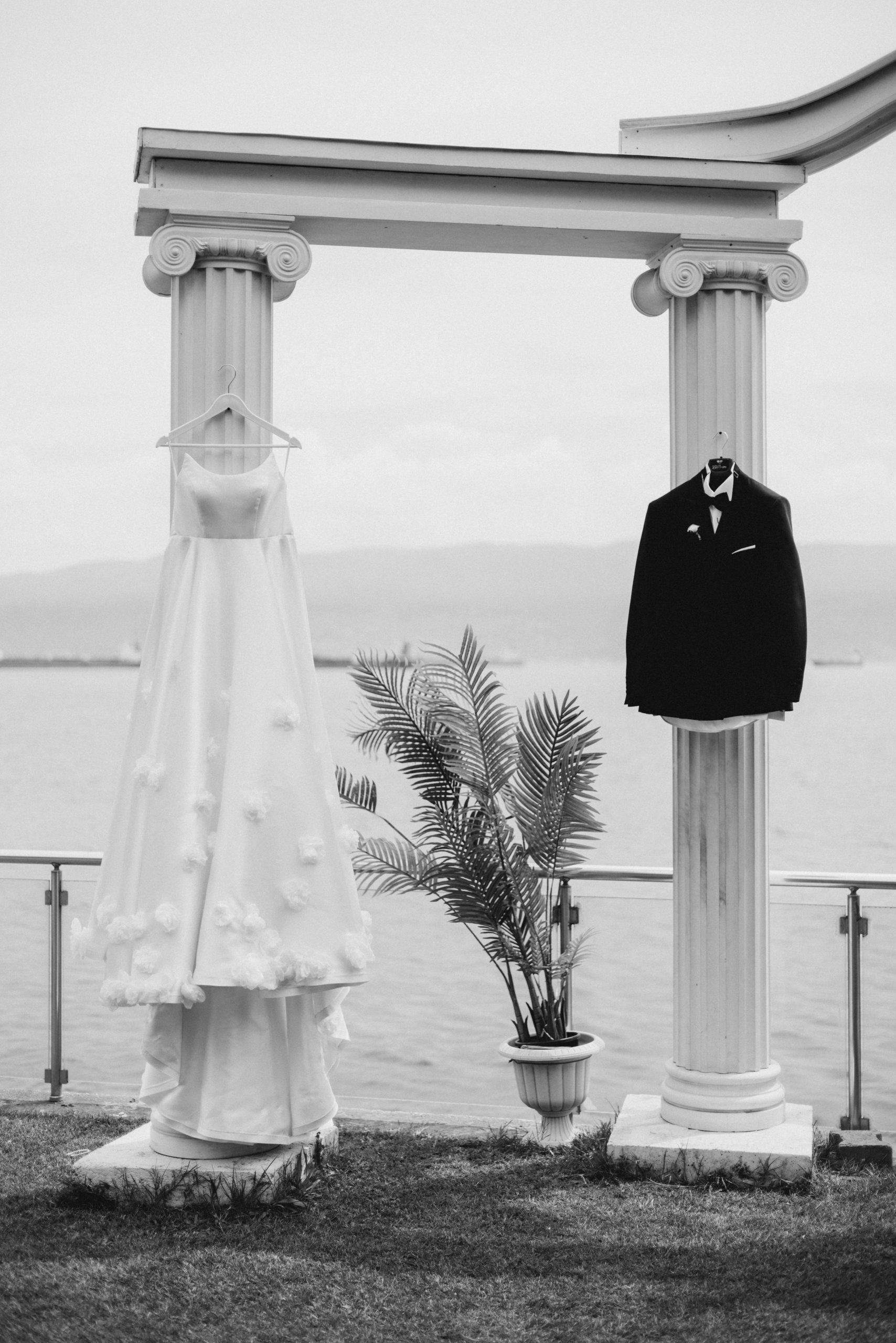 White Dress and Costum Hanging Outside