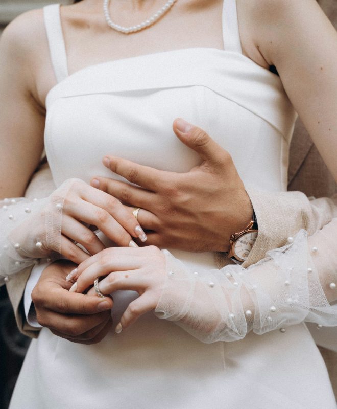 Bride and groom exchanging rings